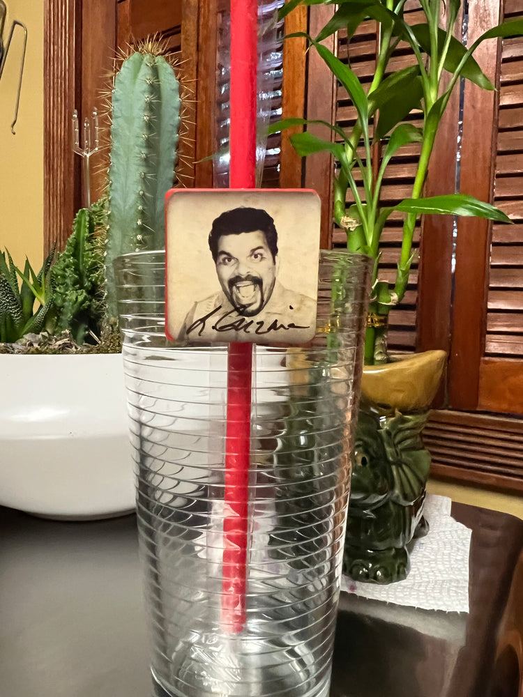 A signed Strawji by Luis Guzman